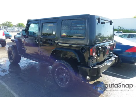 2011 Jeep Wrangler Unlimited Sport z USA, uszkodzony, nr VIN 1J4HA3H14BL510197